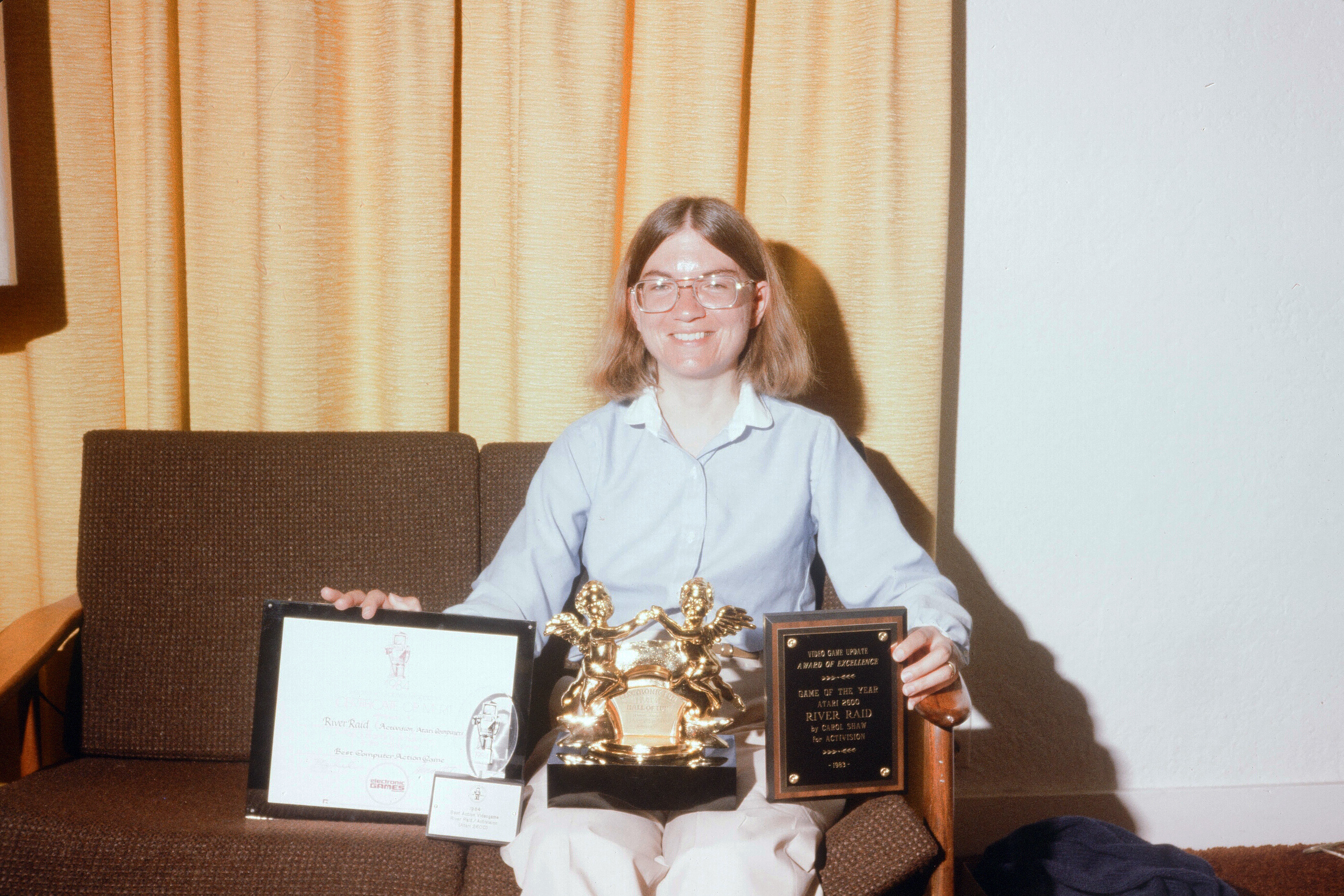 Carol Shaw with her video game awards