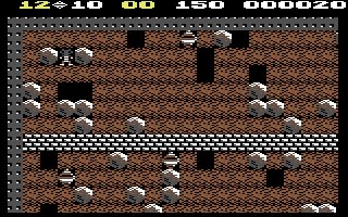 Boulder Dash C64 cave - mid-level gameplay with diamonds and boulders