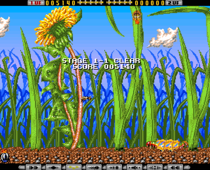 Apidya (1992, Amiga) - in-game screenshot showing the bee protagonist navigating enemy formations in an early stage